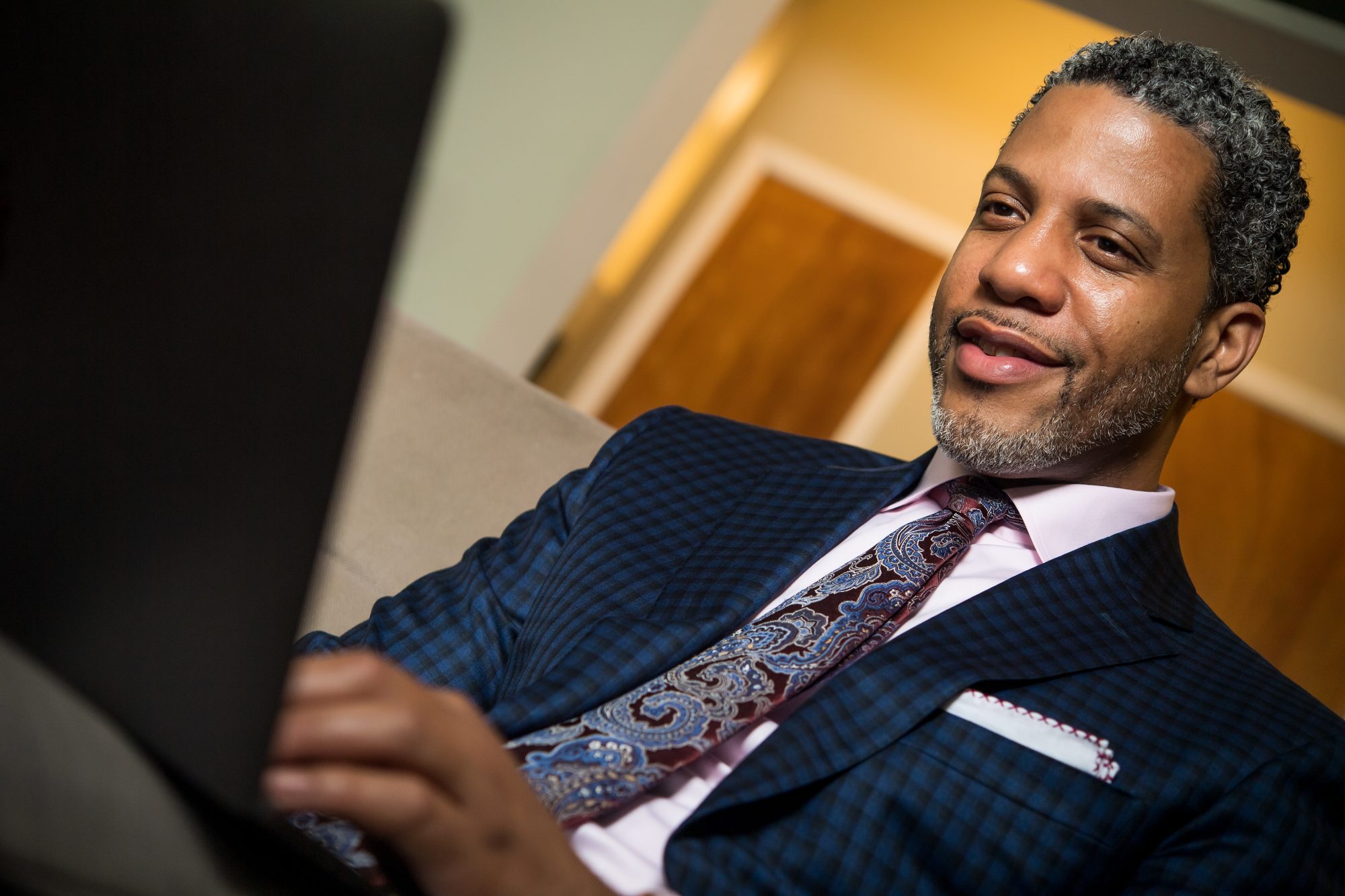 Diallo J. Stevens in conversation with a client